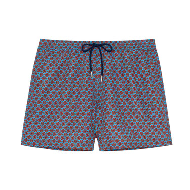 Blue swim shorts with a red pattern on a white background